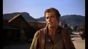 Muere Richard Harrison, el actor que rechazó a Sergio Leone y filmó un spaghetti western en La Pedriza 2 Richard Harrison vestido de vaquero en un fotograma de uno de sus westerns